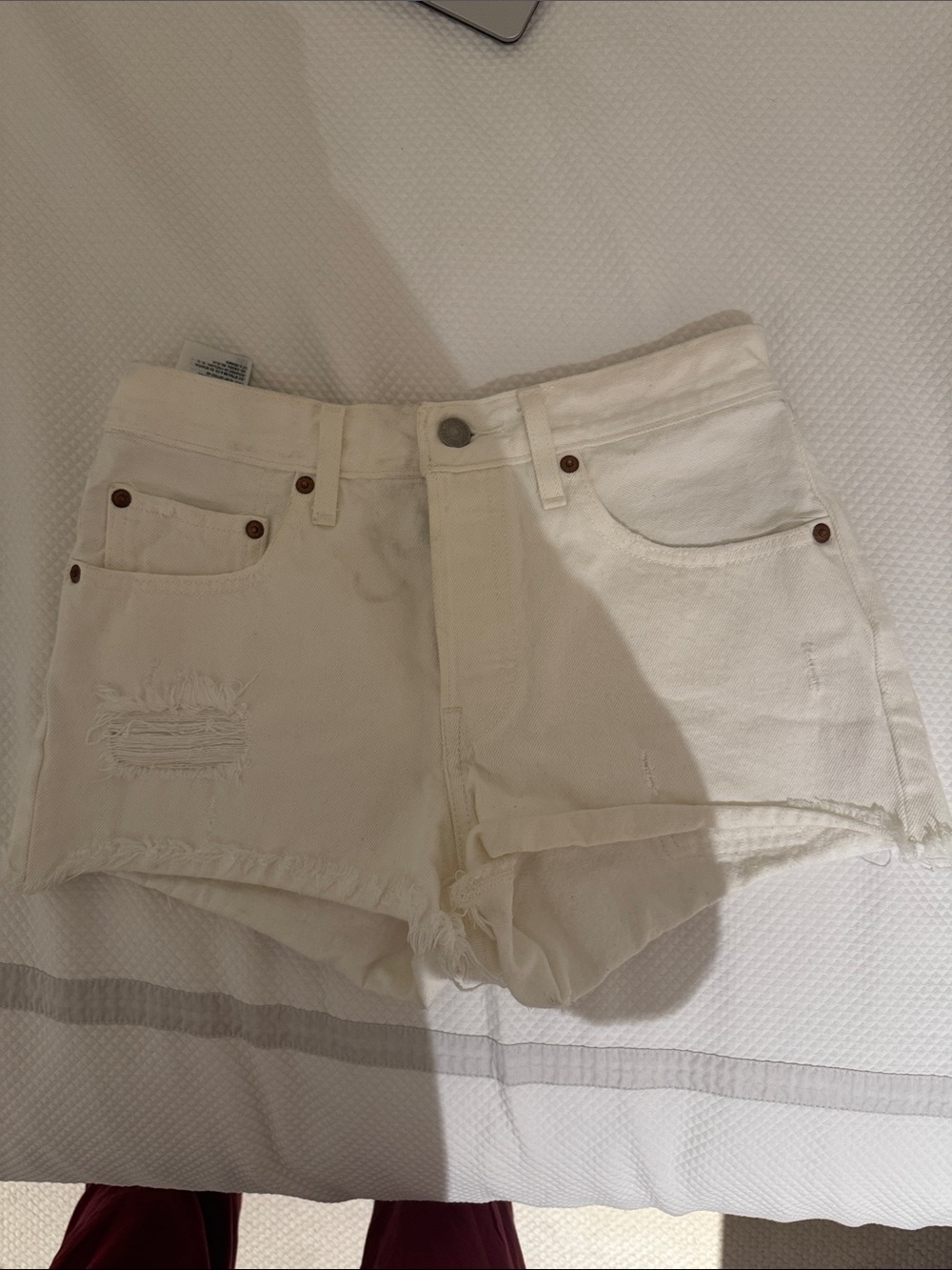 Levi's White Distressed Denim Cutoff Shorts